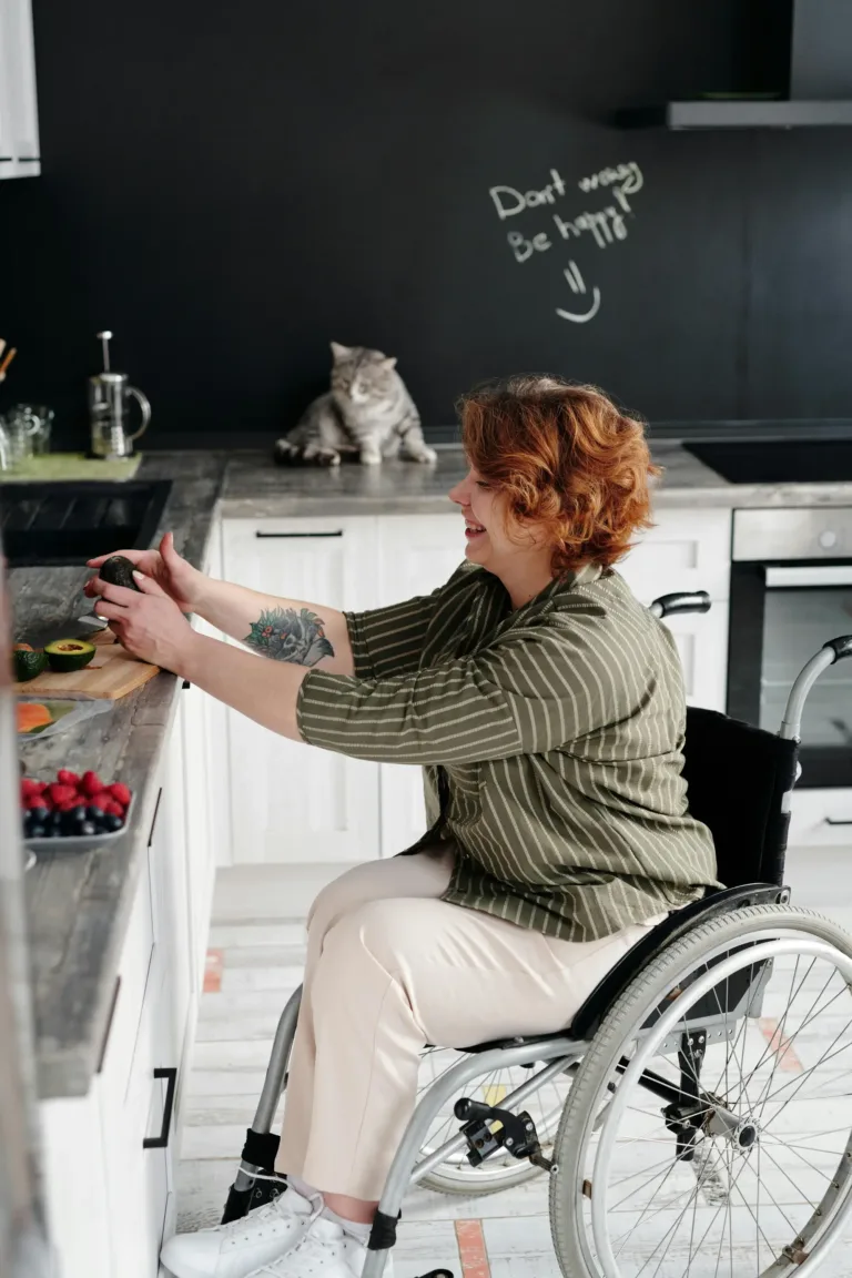 happy disabled women in her kitchen